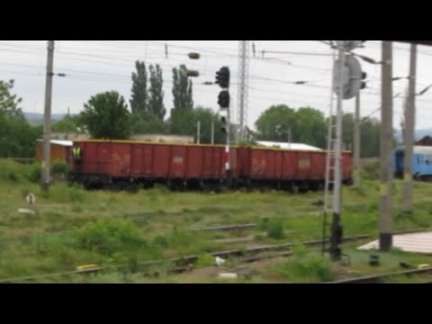 Romania: Bacau, loose shunting and yard activity viewed from a moving train