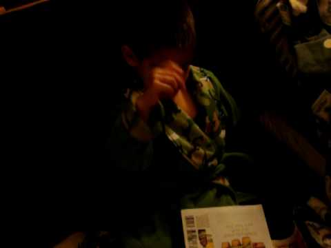 Mr. Hugh Hefner reading the paper