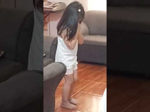 Angela dances with the rythymn of the song!!