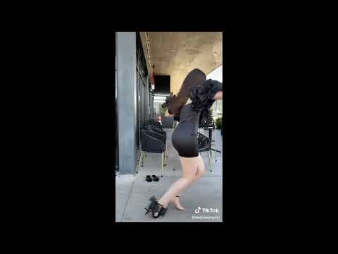 Model and Influencer Melisa Angulo FALLS in skimpy black dress and fancy high heels