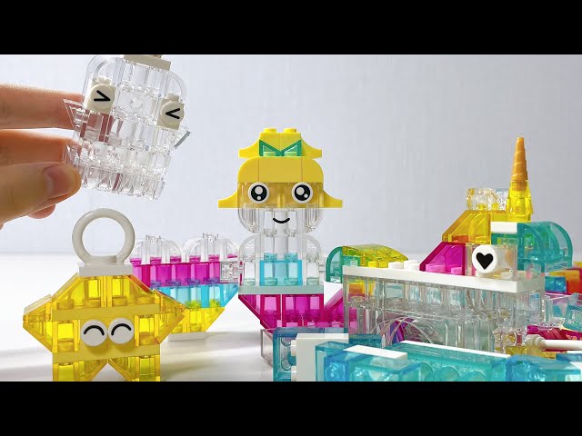 Vídeo relacionado con LEGO Classic Caja de Magia Transparente - Manualidades de Pascua para Niños - Figuras de Animales de Juguete, Nave Espacial, Unicornio, Narval y Más - Regalo para Niñas y Niños de 5+ Años - 11040