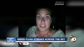 Green flash streaks across sky