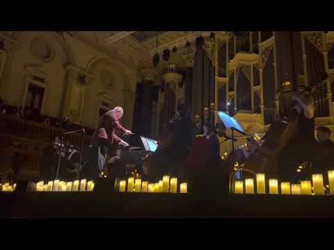 “Merry-Go-Round of Life” by Joe Hisaishi performed by the Fever Candlelight Orchestra