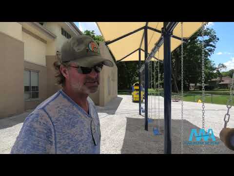 Installation of a Commercial Shade Structure for a Swing Set