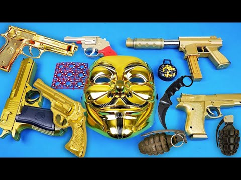 V for Vendetta Maskesi ve Oyuncak Boncuk Atan Altın Silahlar Video
