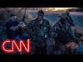 Armed militia group detains migrants at the border Armed militia group detains migrants at the border