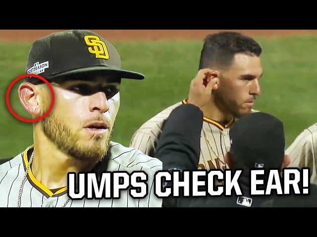 Umpires check pitcher's ears for a foreign substance, a breakdown