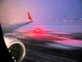 Boeing 737-800W taking off in snowstorm (EKCH ...