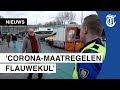 Verhitte corona-discussie op Amsterdamse markt