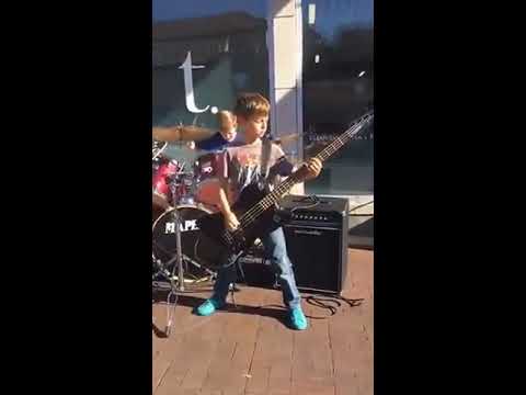 Kids rocking in front of coffee shop