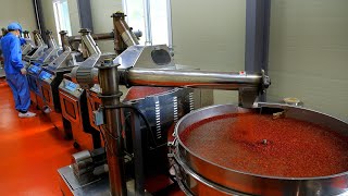 The process of mass production of red pepper powder. Korean red pepper powder factory.
