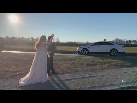 Would-be wedding guests surprise newlyweds with a drive-by celebration