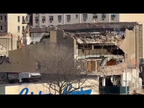 Part of vacant building collapses onto scaffolding below in the Bronx
