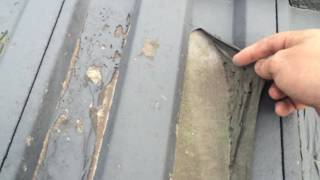 Review of what a bad roof painting job looks like and how it will cost much more to fix it now.