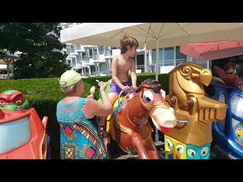 Cool Dude ride a horse toy on the beach at Albena, Bulgaria