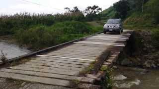 preview picture of video 'Driving Over a Log Bridge at Rio Chiquito south of Lake Arenal, Costa Rica.'