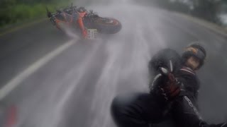 Motorcyclist Saves Girlfriend after Crash in Rain