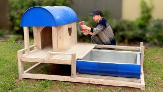 Build cheap dog house from wood and old barrel