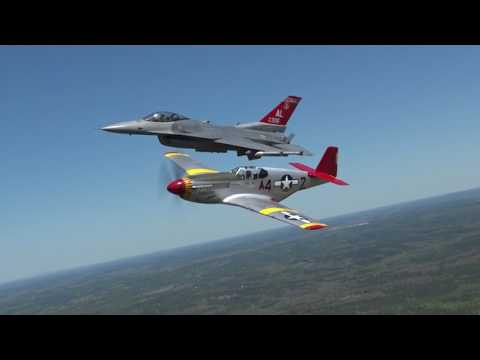 CAF Red Tail Squadron's P-51C Mustang flies in formation with F-16 in honor of Tuskegee Airmen