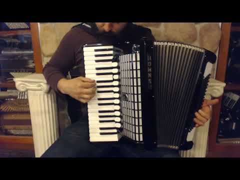 5611 - Black Hohner Tango IVP Piano Accordion LMMH 37 96 $2199