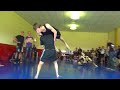 Tall Blonde Lifting Up Skinny Boy In Wrestling