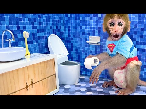 Monkey Baby Bon Bon plays toy cars with puppy and open surprise eggs