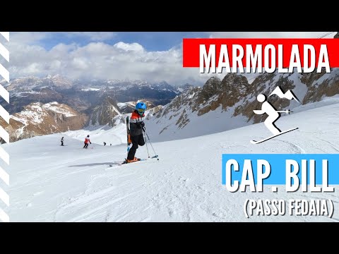 Marmolada glacier ski slope from Punta Rocca (3265 m.) to Capanna Bill (Fedaia) integral descent