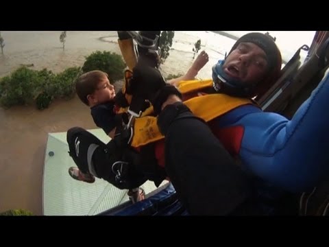 Four dead, dramatic rooftop rescues in Australia floods
