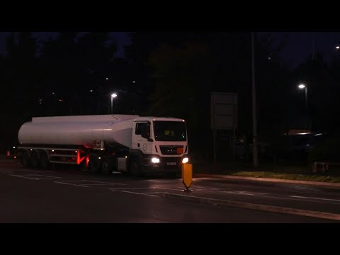 Fuel tankers leave depot as UK army set to deliver petrol amid fuel crisis | AFP