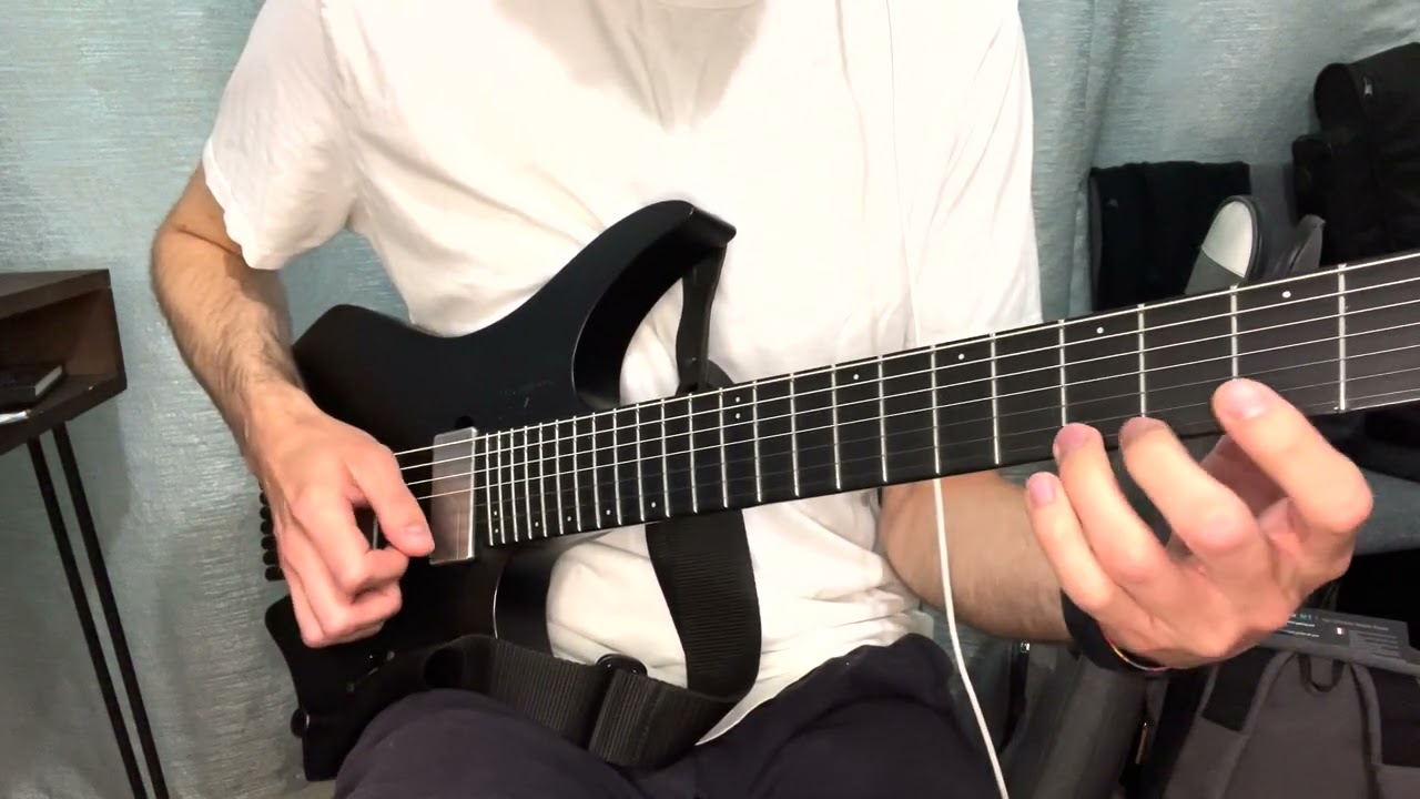 Roberto Barlocci demonstrating a one-note four-finger independence exercise on electric guitar