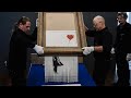 Banksy S Shredded Painting Sells For Record 25 4 Million
