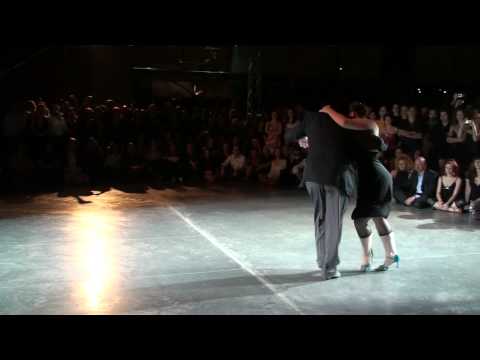  Fernando Sanchez  and  Ariadna Naveira  are  dancing  to  the  tango  "  Siga El Corso  "