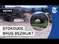 Historische brug (400 jaar!) bezwijkt onder noodweer
