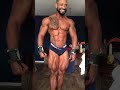 Bodybuilder posing on room afther contest