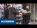 Dankbare winkeliers geven bloemen aan politie - OMROEP WEST