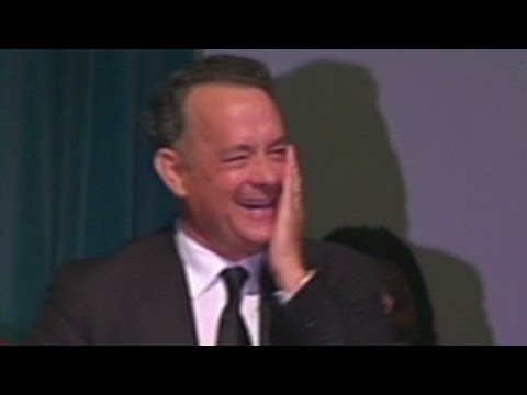 Tom Hanks cracks up memorial service