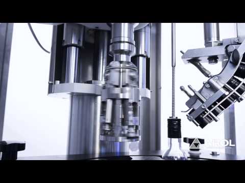 SINGLE-HEAD CAPPER FOR ALUMINUM R.O.P.P. CAPS ON GLASS CONTAINERS