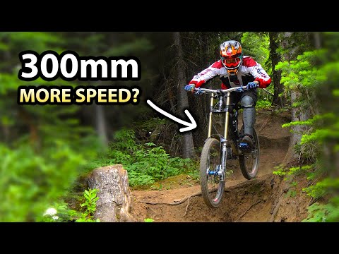 300mm vs 200mm of suspension, Does more travel = more speed?