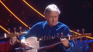 Ayaan and Amaan Ali Bangash performing with Amjad Ali Khan