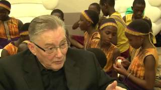 The African Children's Choir sing happy birthday to their founder Ray Barnett in Belfast