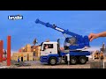 Bruder - John Deere 6920 su apverčiama priekaba, raudona (02057)