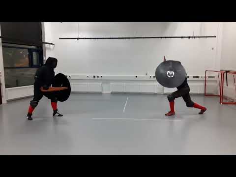 Testing weapon simulators in safety gear 4 - Blades and shields.