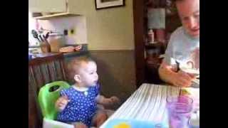 10 month old baby eating - so funny!  Looks like a little birdy
