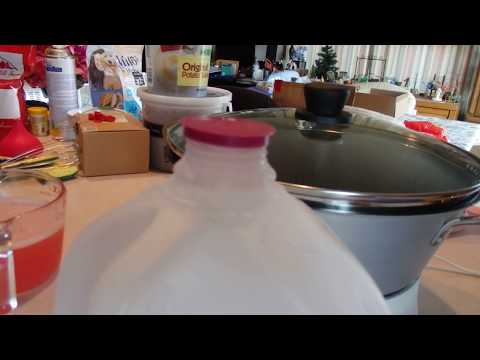 Lid Popping On Empty Milk Jug