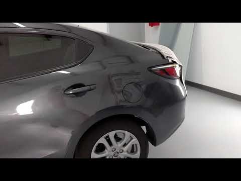 Thumbnail for Toyota Yaris AKA Scion iA being tinted with Llumar Classic ATC 30/15 Window Film at Tint Man WP, FL by Scion iA