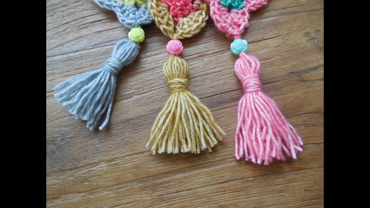 franjes aan je sjaal deel 5: Een kwastje maken met kraal