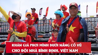 Khán giả phơi mình dưới nắng cổ vũ cho đội nhà Bình Định, Việt Nam| Báo Lao Động