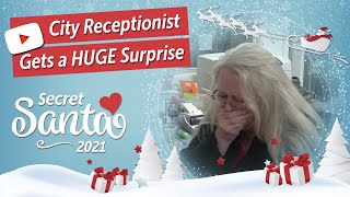 City receptionist gets a huge surprise from Secret Santa