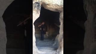 Playing a Flute Prayer in an ancient city in Turkey Built in the Mountain