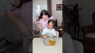 Mother kidding on her daughter